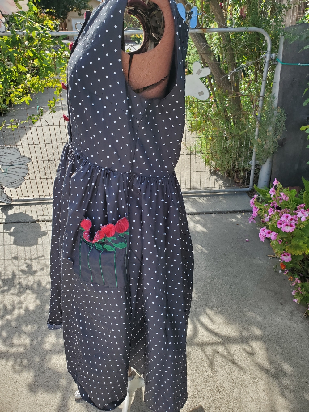 Black Polka Dot Sleeveless Casual Dress with Red Rose Accents - Picture 4 of 6